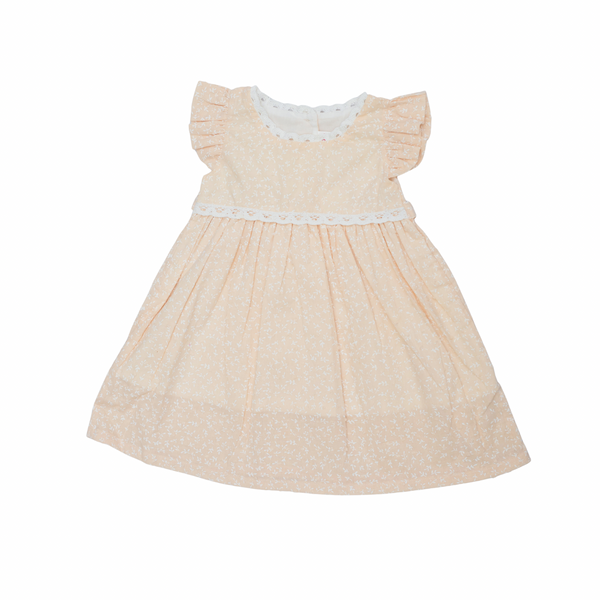 Beige dress with white lace details on a white background