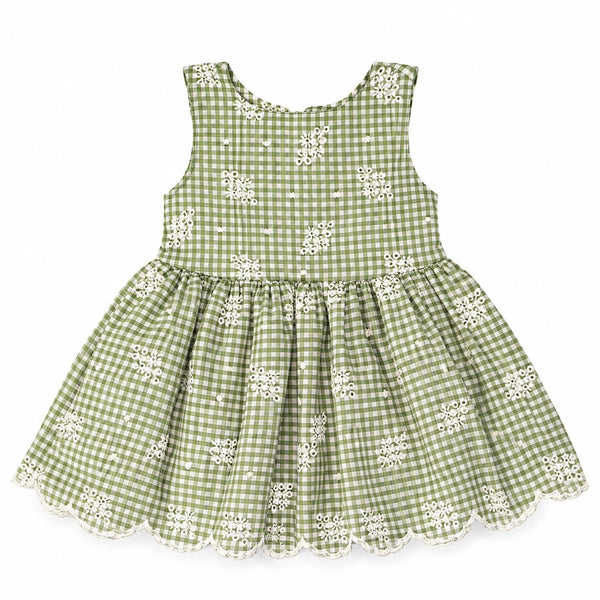 A sleeveless baby dress in a green and white gingham pattern with white floral embroidery and a white lace-trimmed hem, shown flat on a white background.