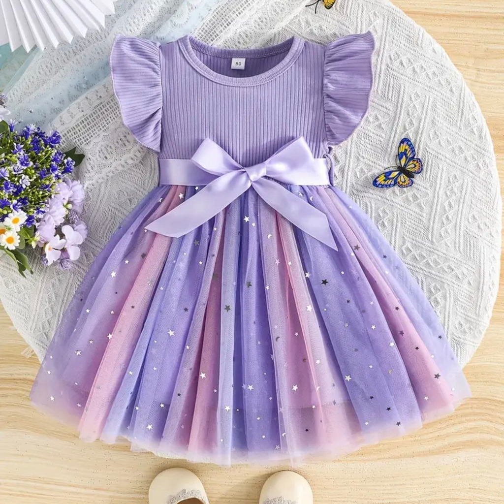 Purple dress with a bow on a textured surface with flowers and a butterfly.