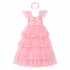 A pink girl's party dress with a matching floral headband, featuring a tiered tulle skirt and ruffled cap sleeves on a solid white background.