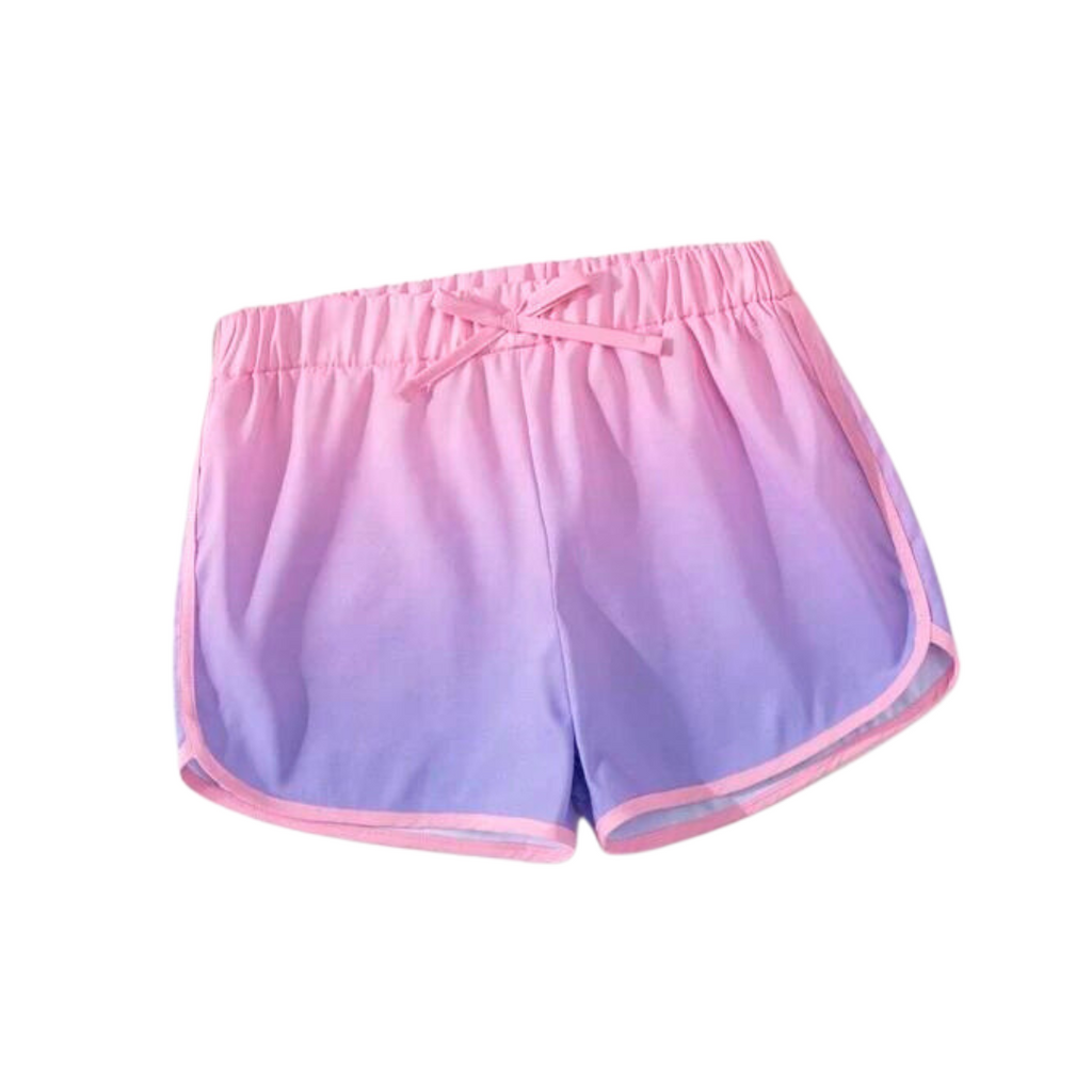 Girls' swim shorts with ombre pink to purple color gradient, elastic waistband, and drawstrings.