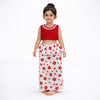 Child wearing a red top and white skirt with red floral pattern on a white background