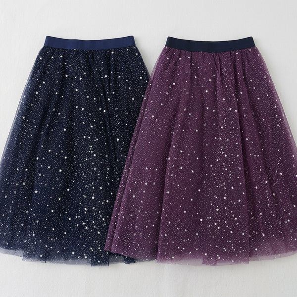  children's skirt combines style and functionality, featuring an adjustable tie-up waistband. 
