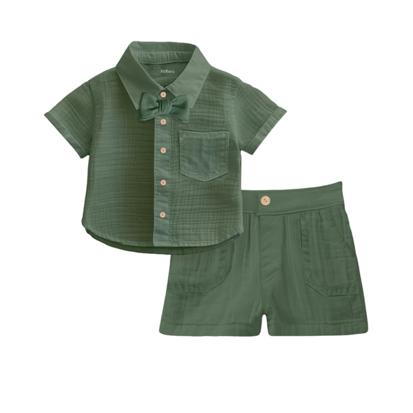 Green children's shirt and shorts set on a white background