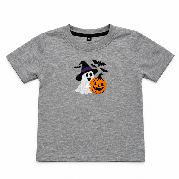 A toddler's heather gray short-sleeve t-shirt featuring a Halloween graphic of a ghost in a witch hat next to a jack-o'-lantern pumpkin, with black bats flying above, shown on a plain white background.