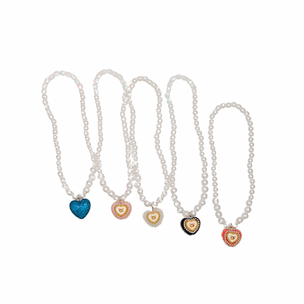 Set of pearl necklaces with heart-shaped colorful charms on a white background