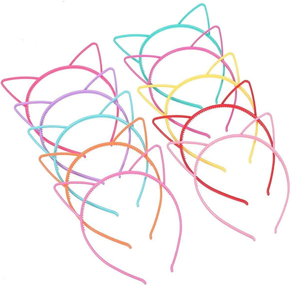 Set of colorful cat ear headbands on a white background
