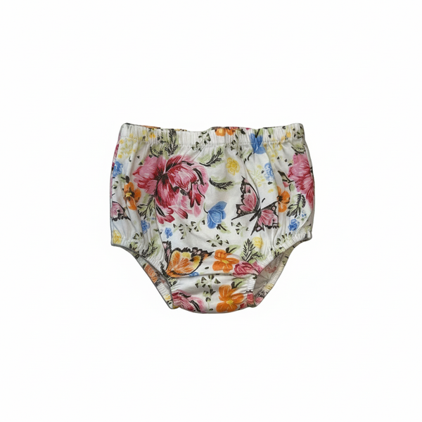 Floral-patterned baby bloomers on a white background