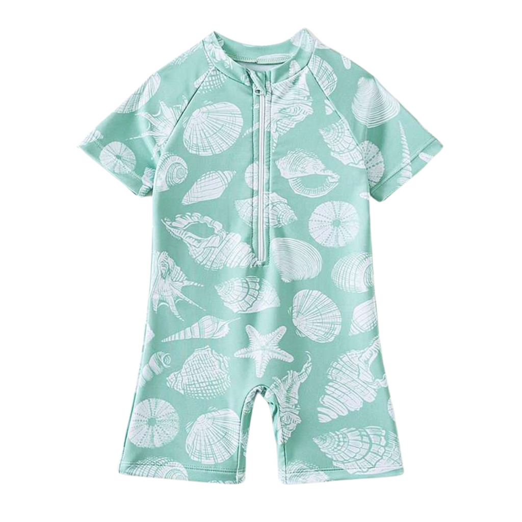 Infant boy short sleeve swimsuit in mint green with a shell pattern.