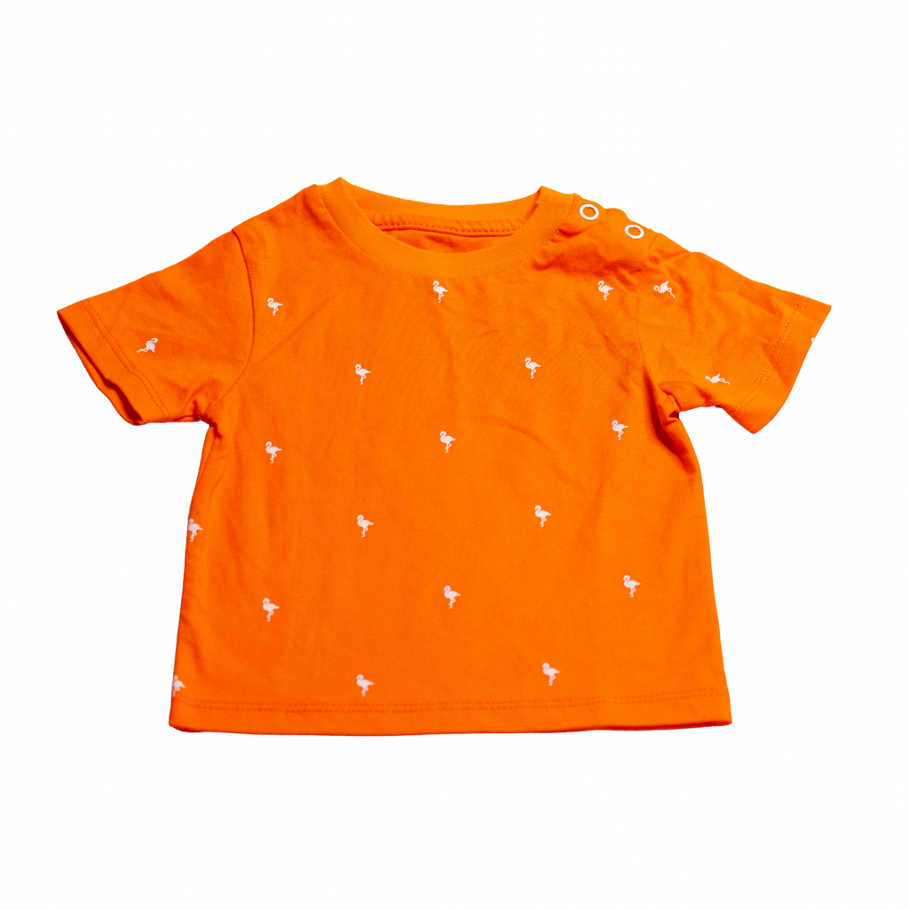 Orange t-shirt with small white patterns on a white background