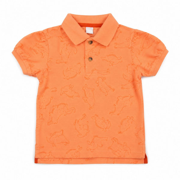 Orange children's polo shirt with animal pattern on a white background