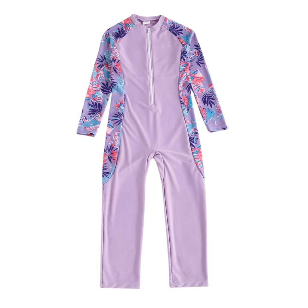 Kids long sleeve rash guard with zipper front and full swimsuit in purple and tropical print design.