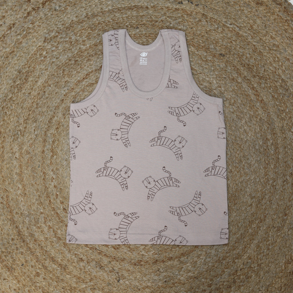 Baby romper with zebra pattern on a textured surface