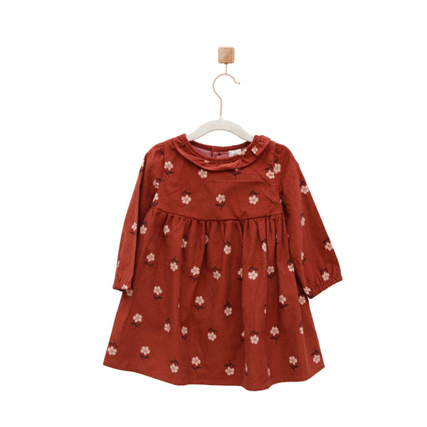 Red dress with floral pattern on a white background