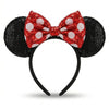 Black mouse ears with a red bow on a white background