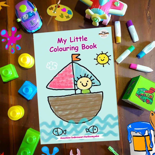 A colorful children's coloring book titled 'My Little Colouring Book' with various playful illustrations, placed on a wooden surface surrounded by toys.