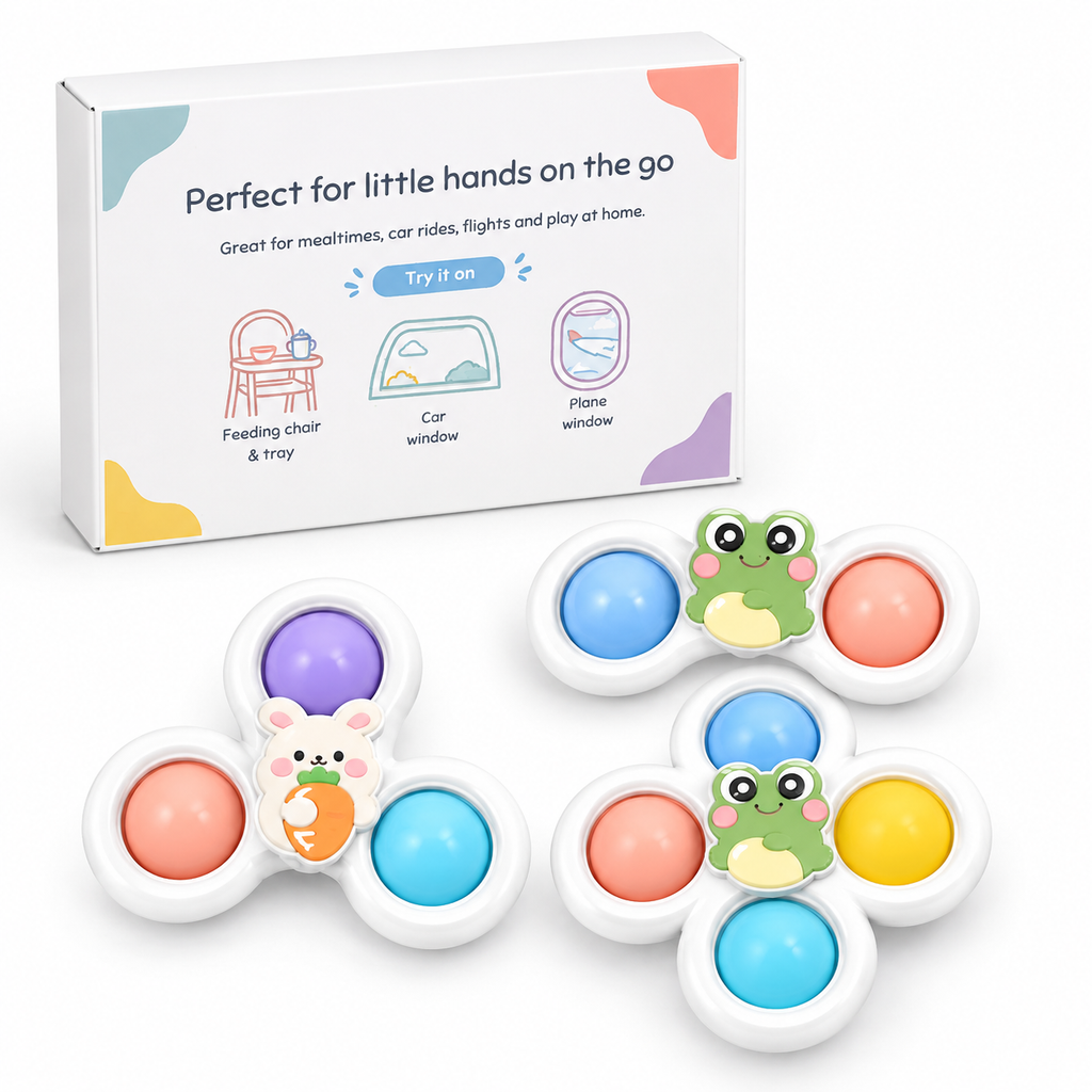 Three white plastic sensory fidget toys with colorful round buttons and cute character cutouts, shown in front of their product box on a clean white background.