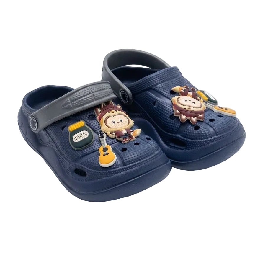 Navy blue clogs with gray straps and cartoon character charms on a white background