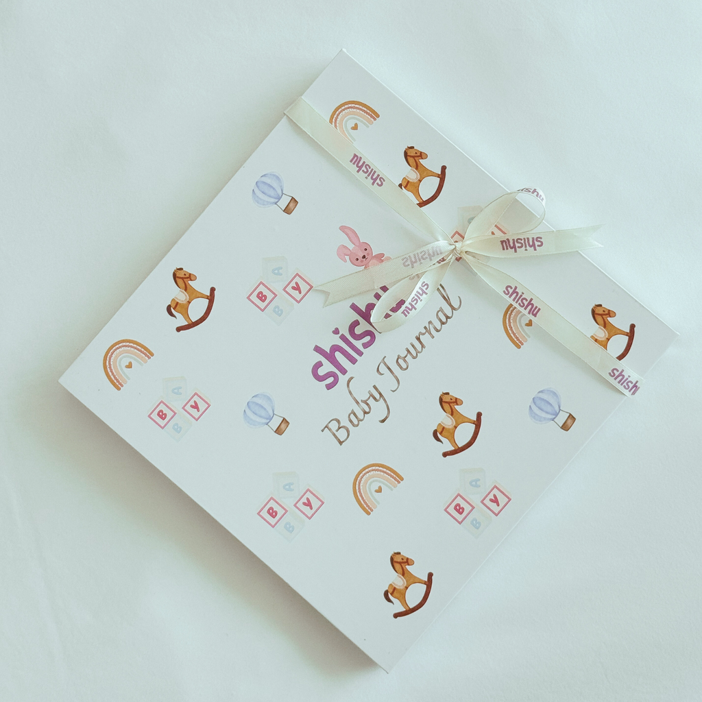 Baby journal with decorative elements on a light background