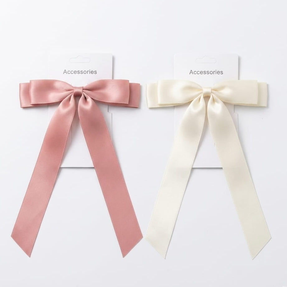 Two satin ribbons, one pink and one white, on a white background with 'Accessories' label.