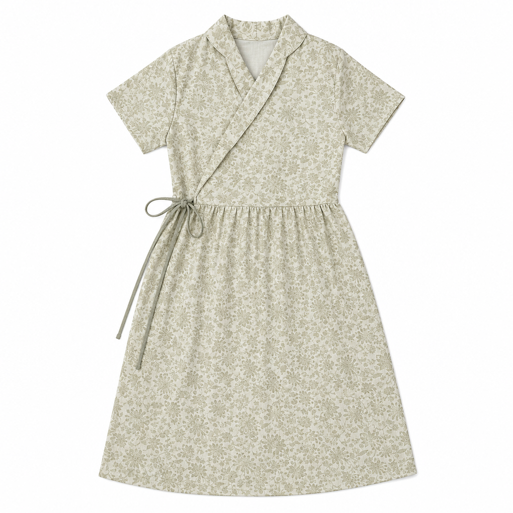 Exude quiet sophistication with The Dandelion Dress, featuring a beautiful wrap-style bodice