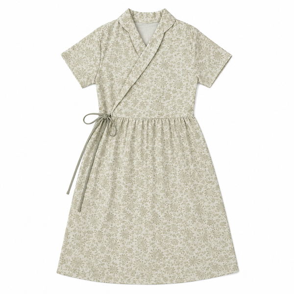 Exude quiet sophistication with The Dandelion Dress, featuring a beautiful wrap-style bodice