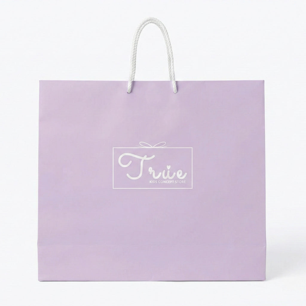 Purple gift bag with 'True' logo on a white background