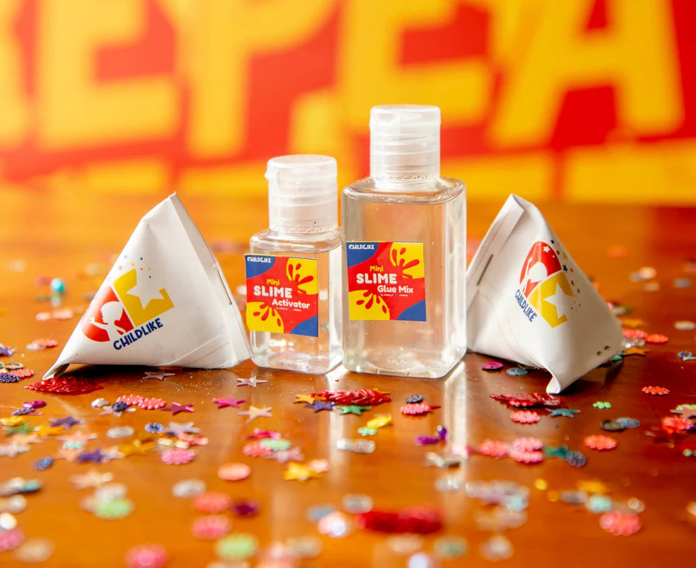Two small bottles with colorful labels and two white triangular containers on a bright orange background with 'Cul du' branding.