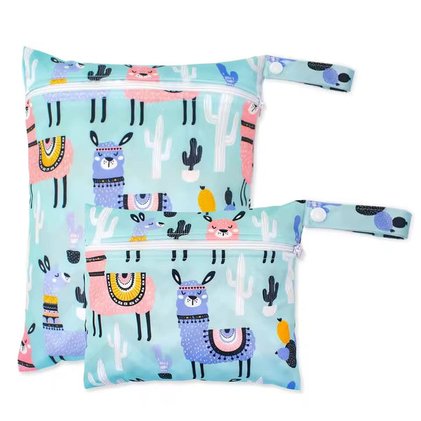 Two reusable shopping bags with llama and cactus pattern on a light blue background