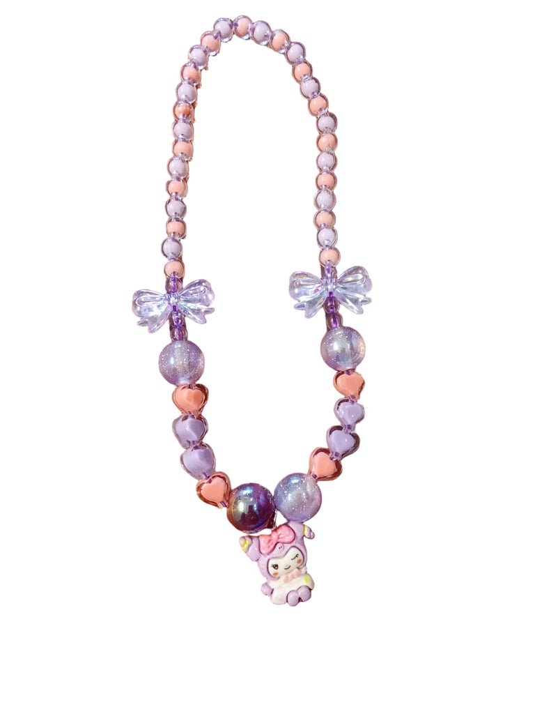 Pastel-colored beaded necklace with bow accents and a small plush toy on a white background