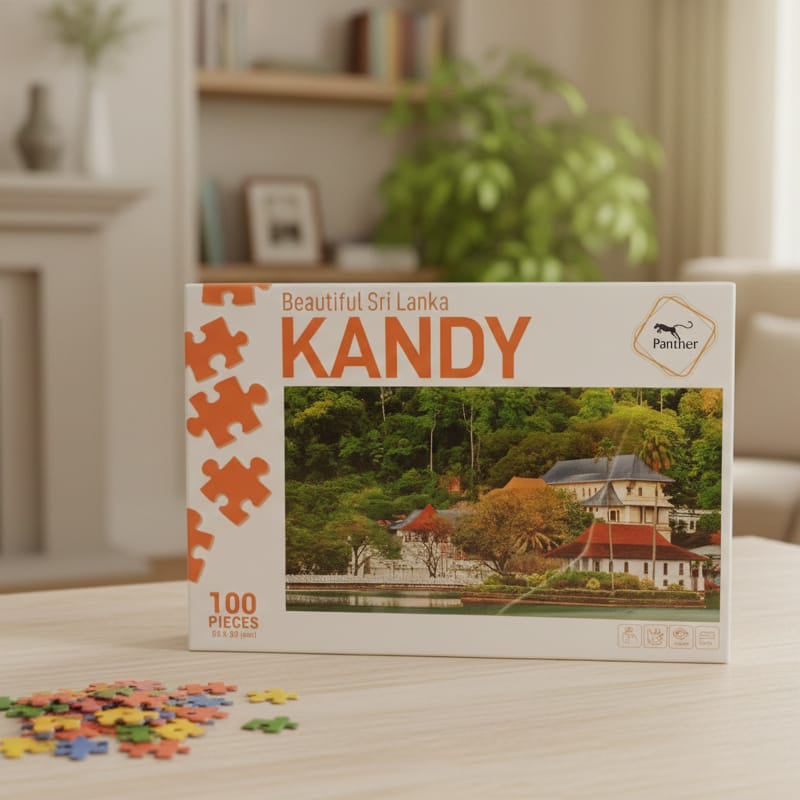 Jigsaw puzzle box featuring Kandy, Sri Lanka on a table in a living room.