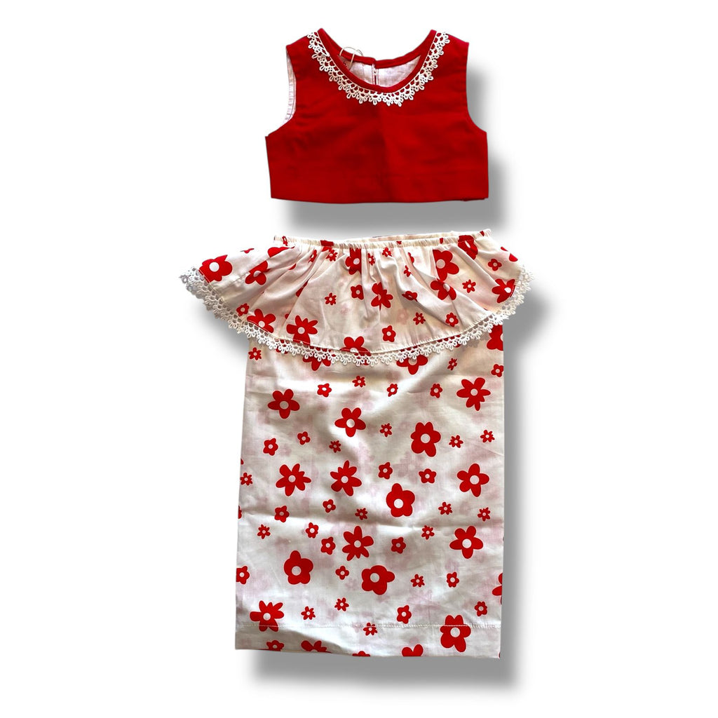 Red top and floral dress set on a white background