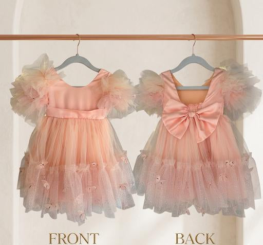 Pink dress with floral details on hangers labeled 'Front' and 'Back'.
