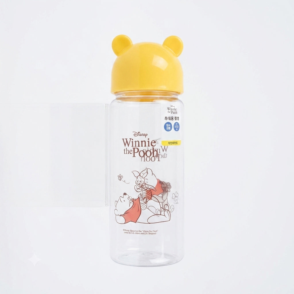 A clear plastic water bottle with a yellow lid shaped like Winnie the Pooh's head, featuring a printed illustration of Winnie the Pooh and Tigger on the front, set against a plain white background.