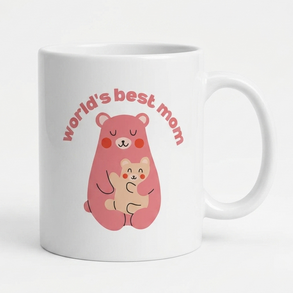 White mug with a pink bear illustration and 'World's best mom' text on a white background