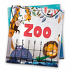 A paperback book cover for 'Zoo' illustrated book on zoo animals, featuring colorful illustrations of various animals such as a giraffe, lion, monkey, and crocodile behind a fence. The cover also includes the title 'ZOO' prominently displayed.