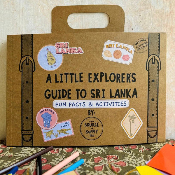 Children's book titled 'A Little Explorer's Guide to Sri Lanka' on a textured surface.