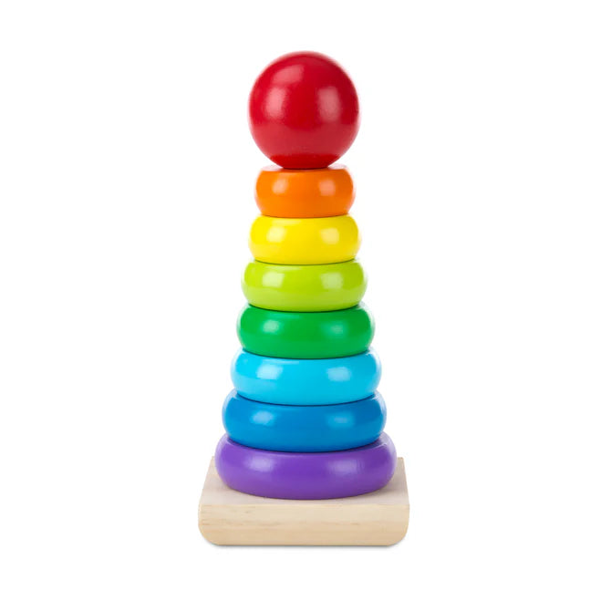 A colorful wooden stacking toy with rainbow rings on a rocking base.