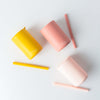 True silicone straw cup in a range of three different colors.