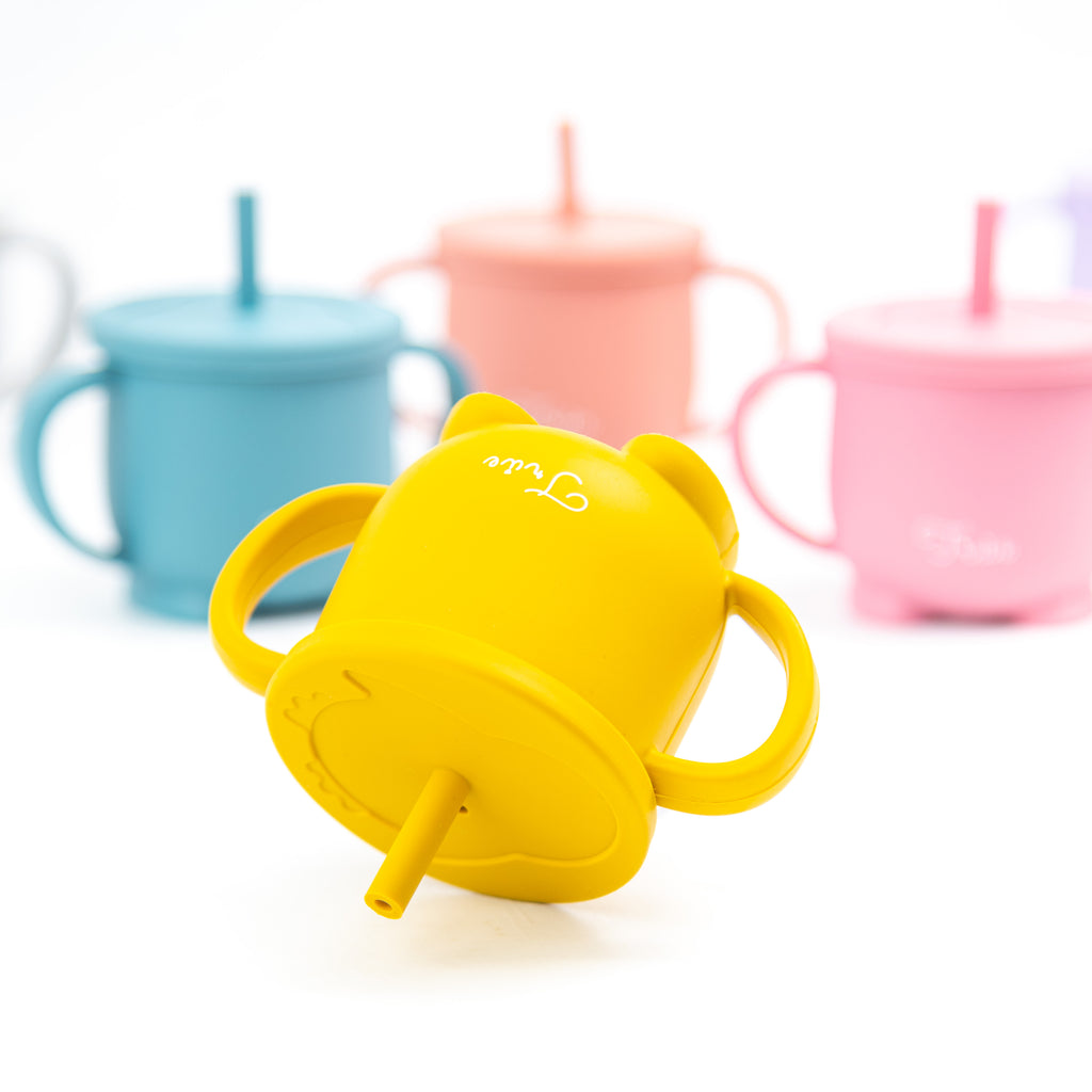 True silicone double handed straw cup, made of BPA-Free material in different range of colors. It come with a snack lid and a straw lid, with two handles. Easy for toddler to hold it.